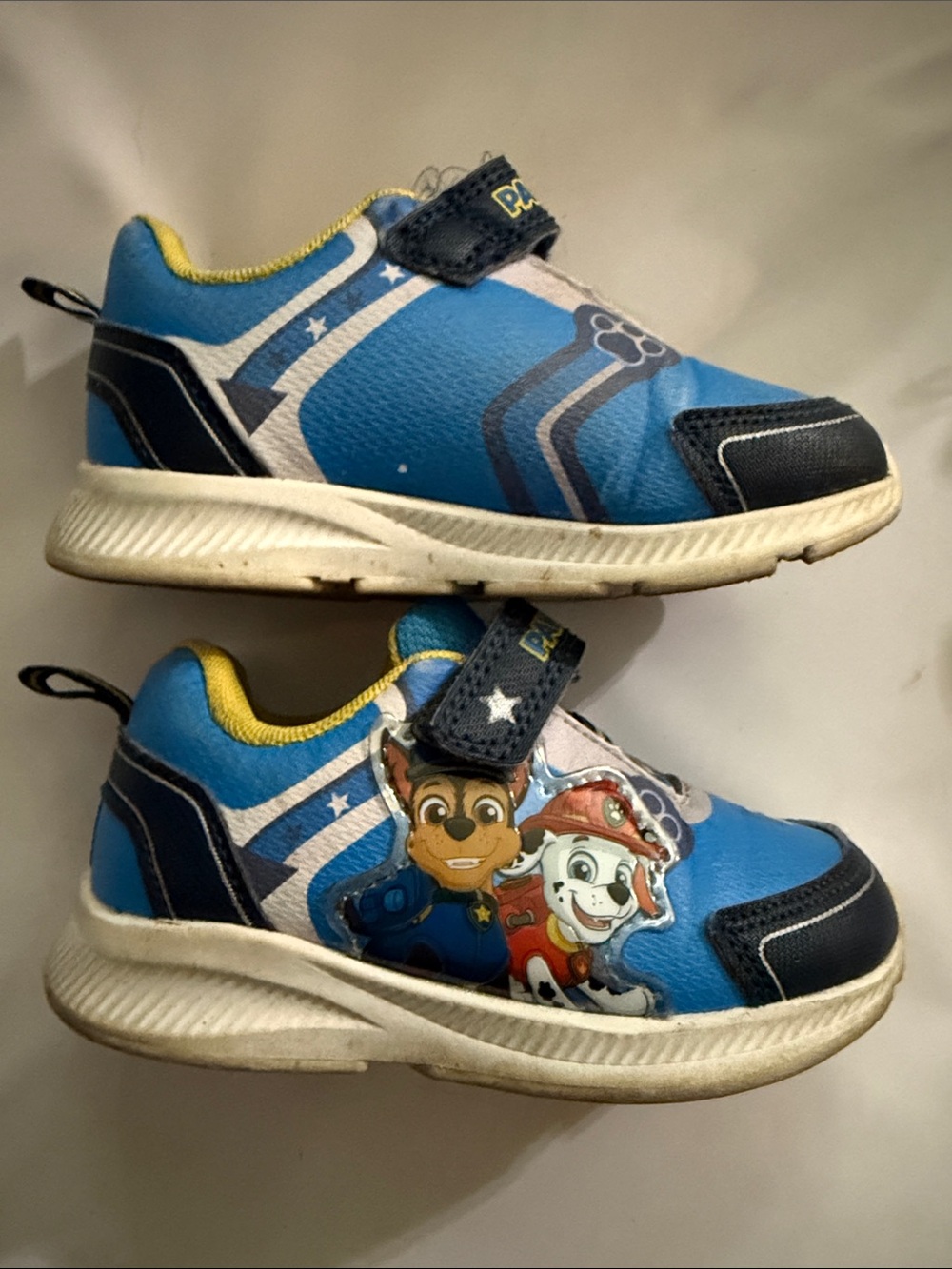 Toddler size 7 paw patrol blue and yellow shoes